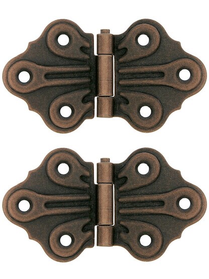 Pair of Butterfly Flush Mount Cabinet Hinges - 1 5/8 inch H x 2 7/8 inch W in Antique Copper.